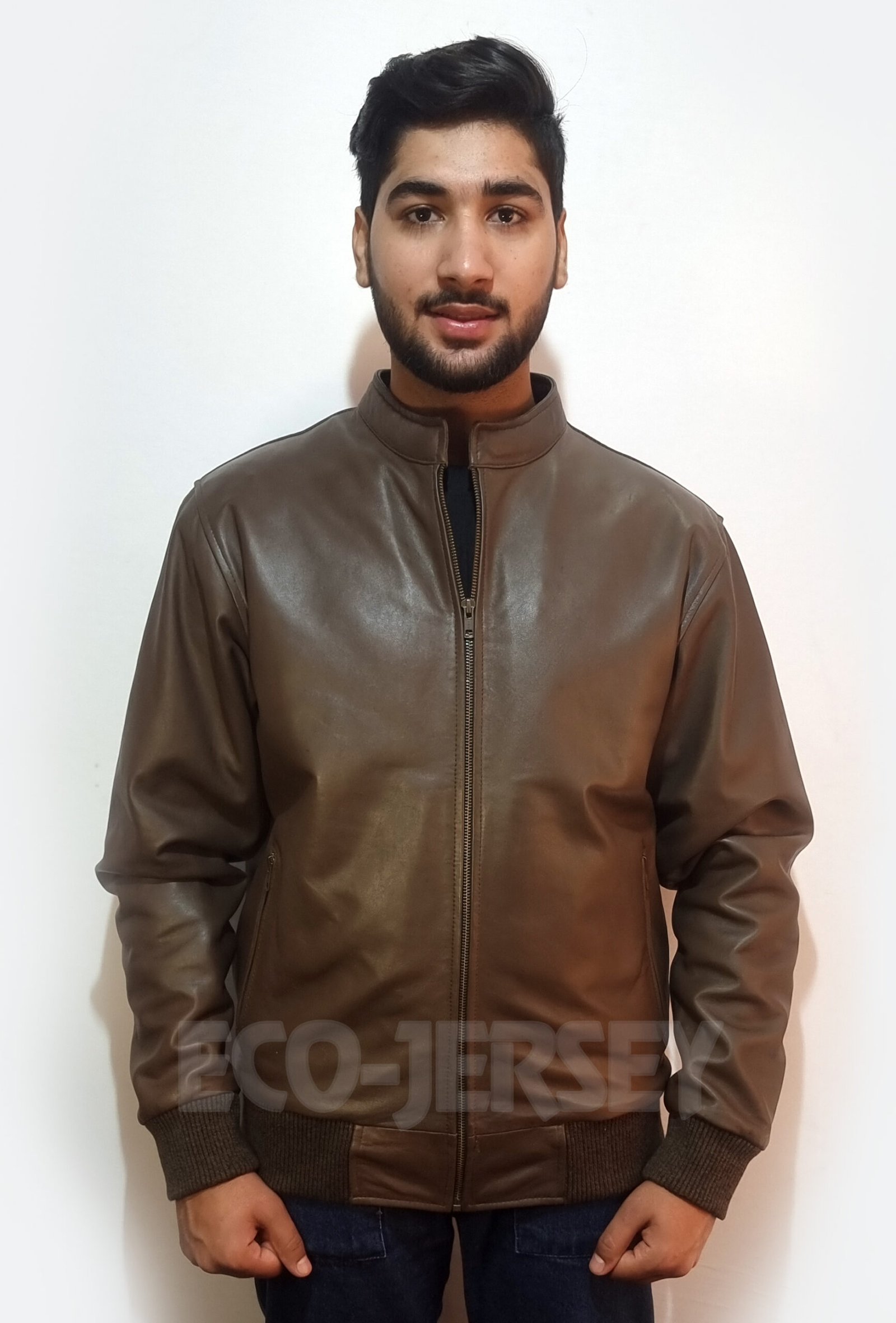 Close-up details of a sepia brown men's leather bomber jacket showing premium stitching and hardware