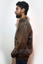 Left side view of a sustainable sepia brown leather bomber jacket for men, showcasing its premium craftsmanship.