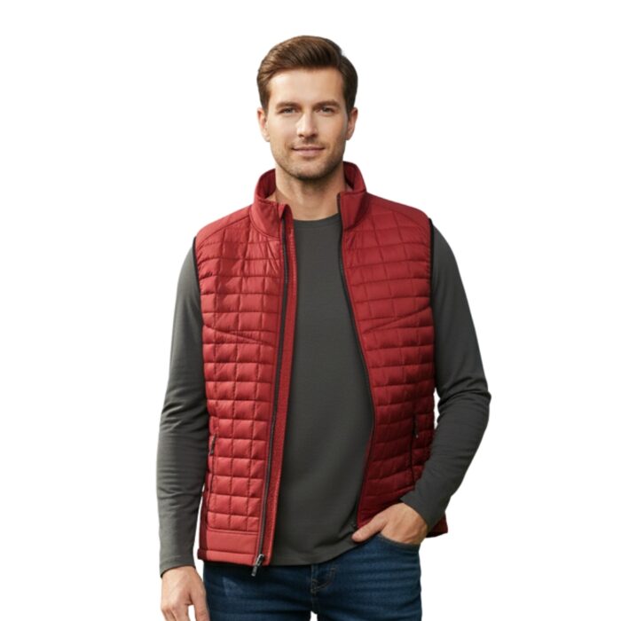 Men’s red quilted golf puffer vest worn over white polo shirt on golf course with clubs in background