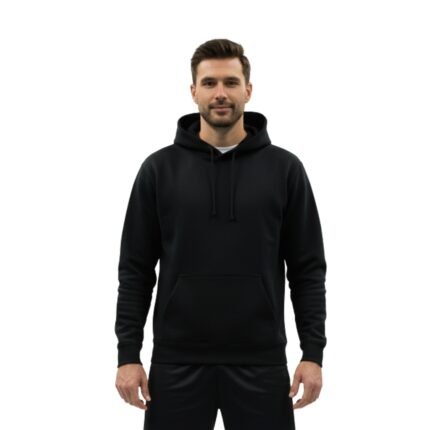 Man wearing a black badminton hoodie and pants, standing against a white background.