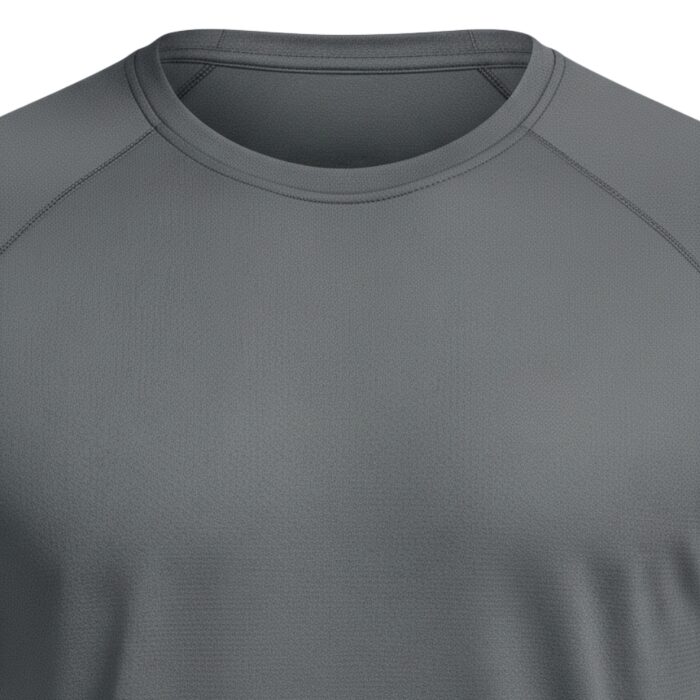 Close-up of a gray short-sleeve athletic shirt with a crew neck and raglan sleeves; small three-dimensional logo on the chest and a textured fabric