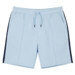Light blue men's tennis shorts with an elastic waistband and matching drawstring, navy side stripes, vertical seam details, and side pockets, displayed on a white background.