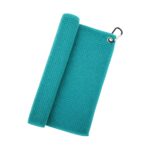 A teal microfiber golf towel, partially rolled on the left with a carabiner attached in the top-right corner.