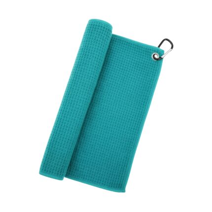 A teal microfiber golf towel, partially rolled on the left with a carabiner attached in the top-right corner.