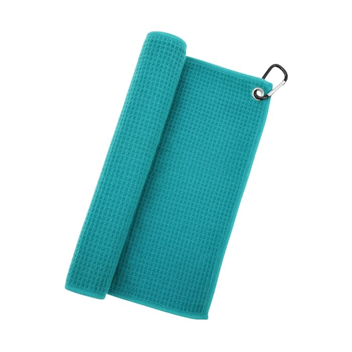 A teal microfiber golf towel, partially rolled on the left with a carabiner attached in the top-right corner.