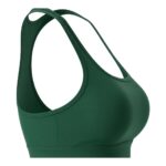 Close-up of a dark green racerback sports bra with a textured/breathable fabric, shown against a white background.