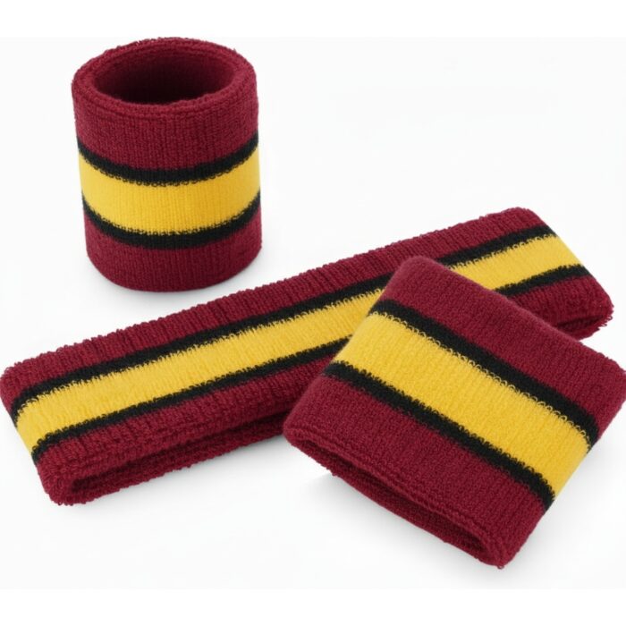 A studio shot of three maroon wristbands with a wide yellow stripe in the middle, bordered by thin black stripes on either side. One wristband stands upright while the other two lay flat with slight overlap. A matching maroon headband sits horizontally in the scene on a white background.