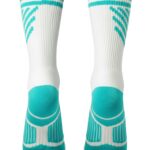 Pair of white athletic socks with turquoise accents; turquoise cuffs with stripes and zigzag pattern, turquoise heel and toe, white body