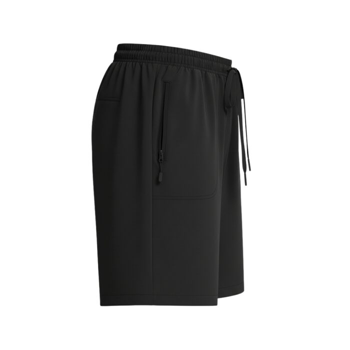Side view of black women’s golf shorts with elastic waistband, drawstring, and a zippered pocket on the left with a nearby regular pocket.