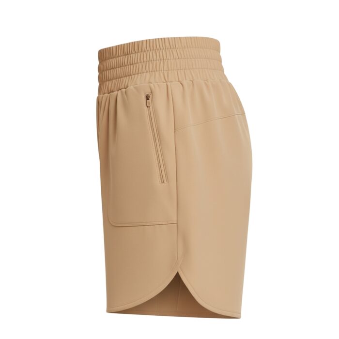 Side view of khaki women's tennis shorts with an elastic waistband, a vertical zipper pocket on the left, rounded layered hem, and a plain white background