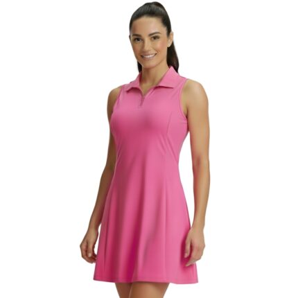 A woman wearing a sleeveless knee-length pink tennis dress with a collared neckline and zipper, paired with white athletic shoes and socks, standing on a white background.