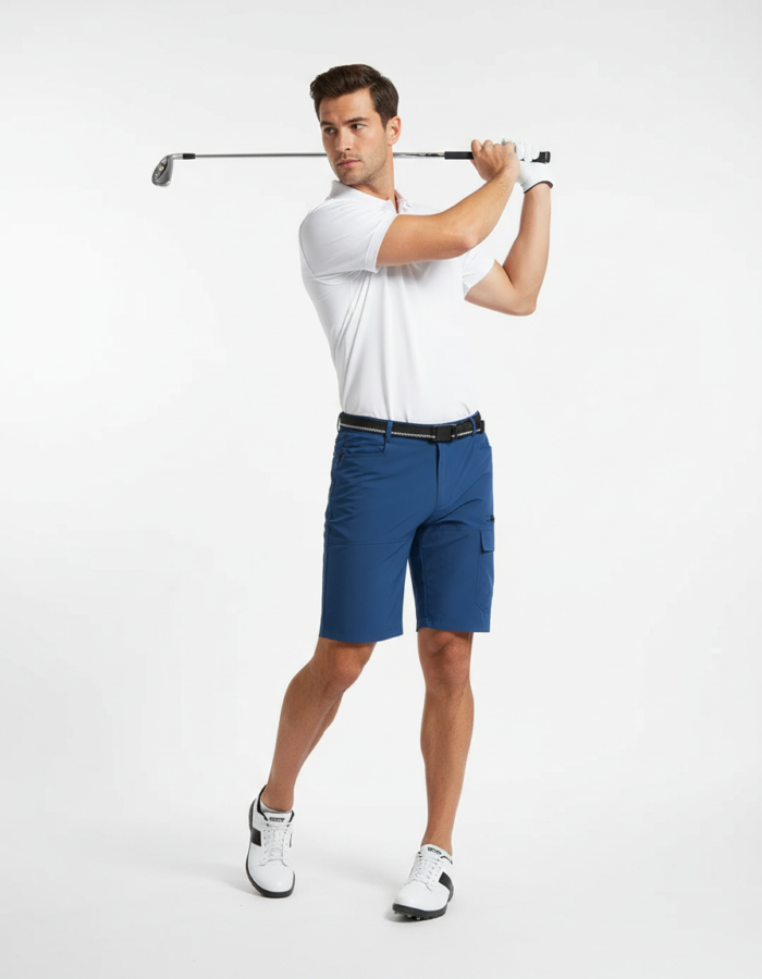 Man in white polo and blue golf shorts mid-swing with a golf club over his shoulder, against a white background.