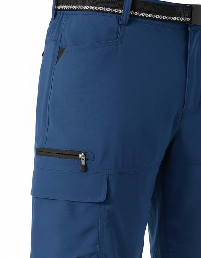 Side view of blue cargo golf shorts with a black-and-white patterned belt, showing a zip pocket on the right leg and additional utility pocket.