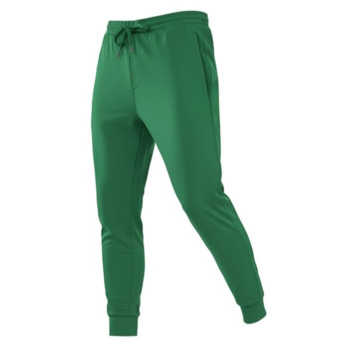 Green men’s rugby training joggers with an elastic drawstring waistband, tapered legs, and elastic cuffs at the ankles.