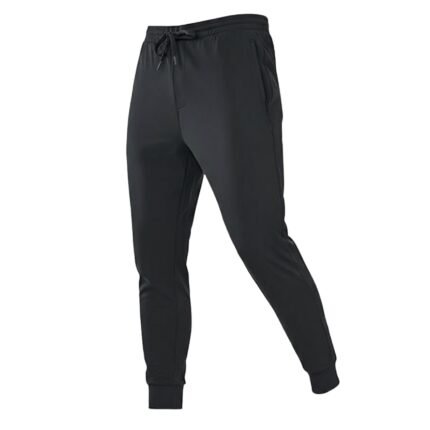 Man wearing black men’s rugby training joggers with an adjustable drawstring waist.