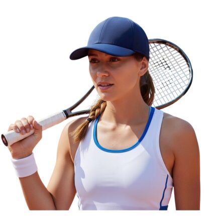 Young woman on a tennis court wearing a navy blue cap, white tank with blue trim, and white wristband; braid in hair