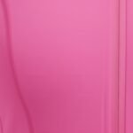 Woman wearing a hot pink badminton jacket with a high stand collar and long sleeves.