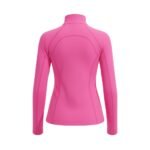 Woman wearing a bright pink badminton jacket with a high stand collar and long sleeves.