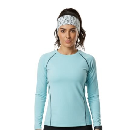 A person wearing a gray patterned headband paired with a light blue long-sleeve athletic shirt.