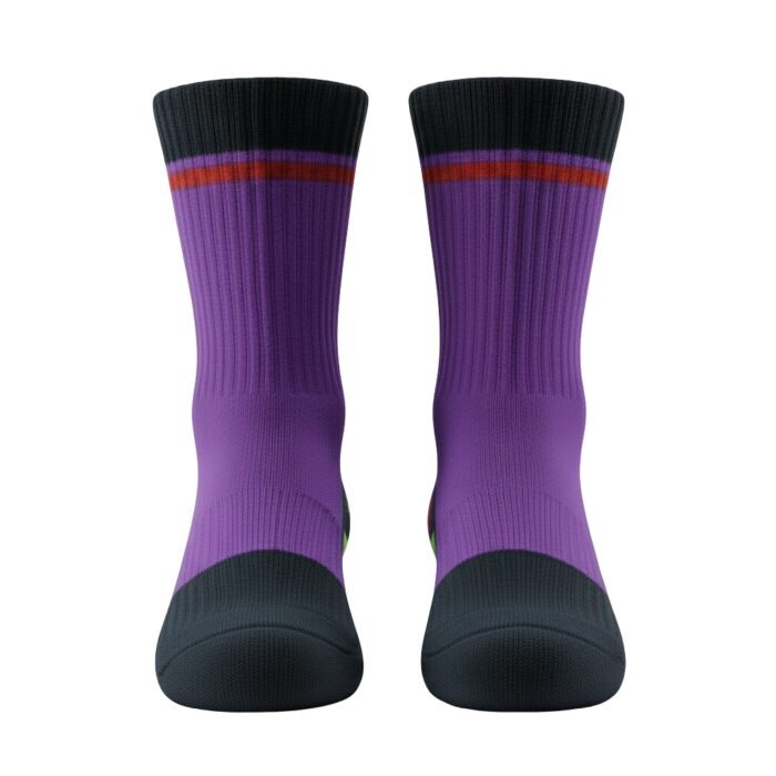 Pair of crew socks shown side-by-side on a white background, with purple legs and toes/soles in dark charcoal, featuring a dark cuff and horizontal stripes near the top in purple, orange-brown, and a thin dark line.