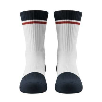 Pair of white crew socks with navy cuffs and a red stripe near the top.