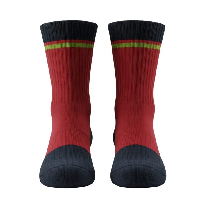 Pair of crew socks side-by-side on a white background, featuring a dark charcoal toe and sole with a ribbed texture, a deep red leg, and a narrow multi-color stripe band near the top in dark charcoal, red, green, and yellow-green.