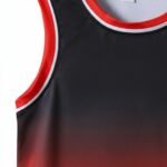 Close-up view of basketball team uniform showing jersey fabric, number, and design details.