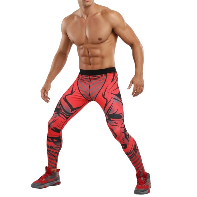 Male basketball player model wearing black compression legging tights and a sleeveless top, standing in a relaxed pose on a plain background.