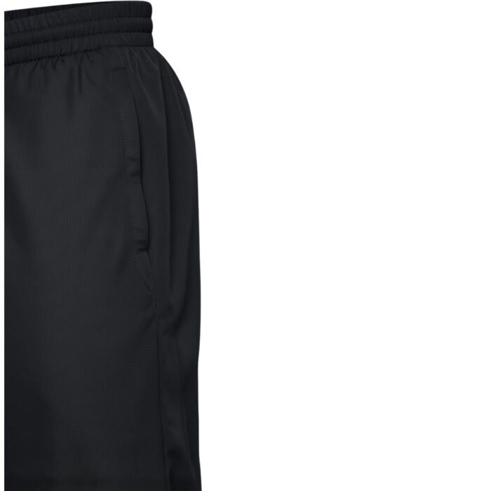 Black athletic shorts with wide elastic waistband and reinforced side pocket — close-up detail