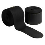 Rolled and unrolled black elastic band with stitched detailing.