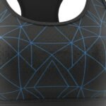 Close-up of black fabric with blue geometric patterns and perforated details on a sports bra.
