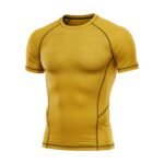 A yellow compression-fit athletic t-shirt with subtle hexagonal patterns on the chest and dark seam accents.