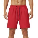 Men wearing red badminton shorts with drawstring waistband.