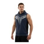 A man wearing a sleeveless navy blue hoodie with a bold white geometric design on the front and black mesh side panels.