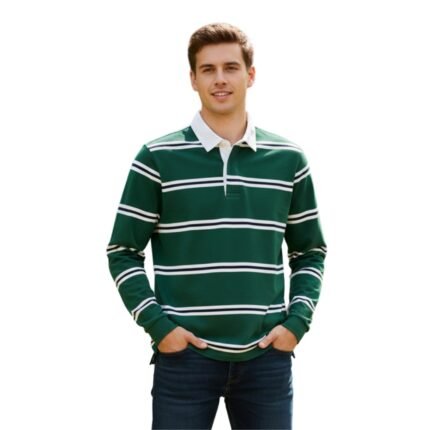 A smiling man in a green-and-white striped long-sleeve polo shirt with white collar and three-button placket, wearing dark blue jeans and white sneakers with blue stripes, posed against black background