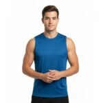 A man with short brown hair wears a fitted solid-blue sleeveless rugby shirt with a ribbed collar and black athletic shorts, standing front-facing against white background.