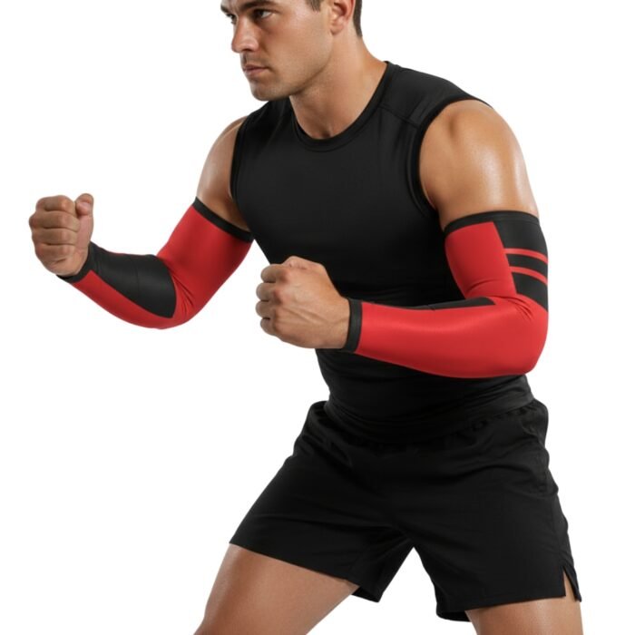 Rugby-style arm compression sleeve in black and red on a male athlete during a training stance.