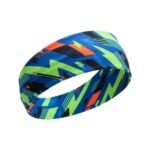 Blue, green, and black patterned fabric headband or cloth roll on a white background