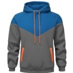 A sporty rugby-inspired hoodie with color-blocked design: bright blue hood and upper chest, textured gray lower body and sleeves, orange drawstrings, and front pockets with orange trim.