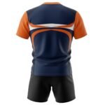 Navy and orange rugby team uniform set with a bold white graphic stripe across the jersey, orange shoulder panels, and black shorts.