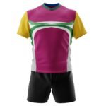 Rugby uniform front view: magenta/purple jersey with white curved panel design, green trim, and yellow sleeve accents, paired with black shorts