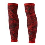 Soccer compression sleeves with sublimated graphic design laid flat on a plain background