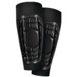 Soccer shinguard sleeves laid flat on a plain background