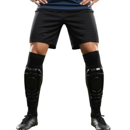 Soccer player model wearing shinguard sleeves, standing in a neutral pose against a plain background