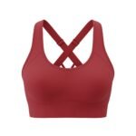 A red sports bra with a crisscross strap design at the back, displayed against a white background