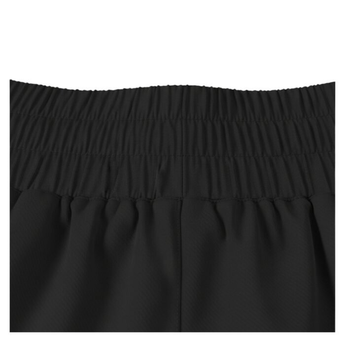 Close-up of black women’s performance athletic shorts with elastic waist and relaxed fit.