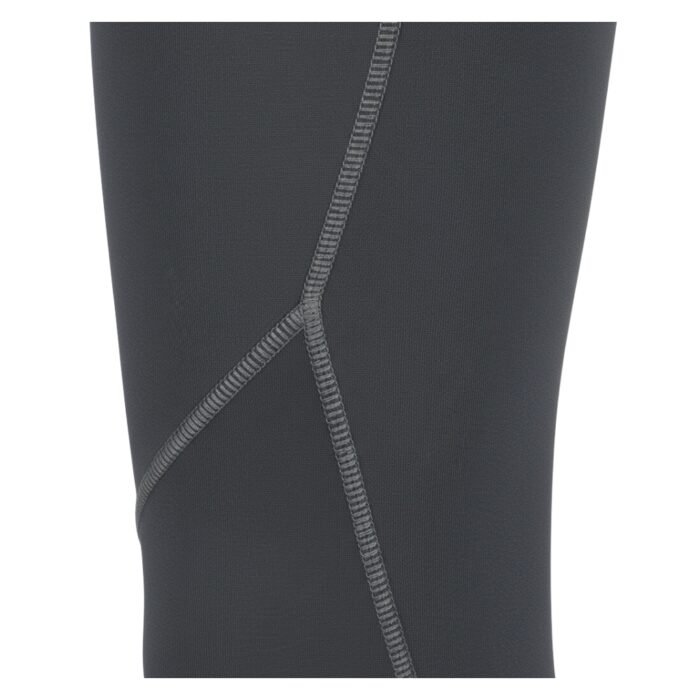 Close-up of dark gray athletic leggings showing detailed stitching and fabric texture.