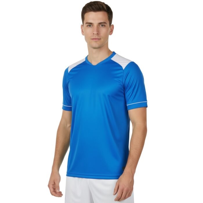 Male model wearing a blue soccer jersey with white shoulder and sleeve accents, paired with white shorts, standing against a plain white background.