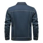 Men’s dark blue denim jacket back view with contrast stitch paneling and buttoned cuffs