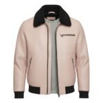 Front view of a pastel pink leather jacket with a textured finish, featuring a black shearling-style collar, zippered chest and side pockets, and ribbed black cuffs and waistband
